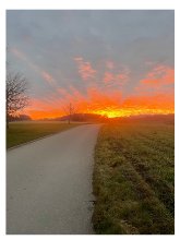 Sonnenuntergang über den Feldern